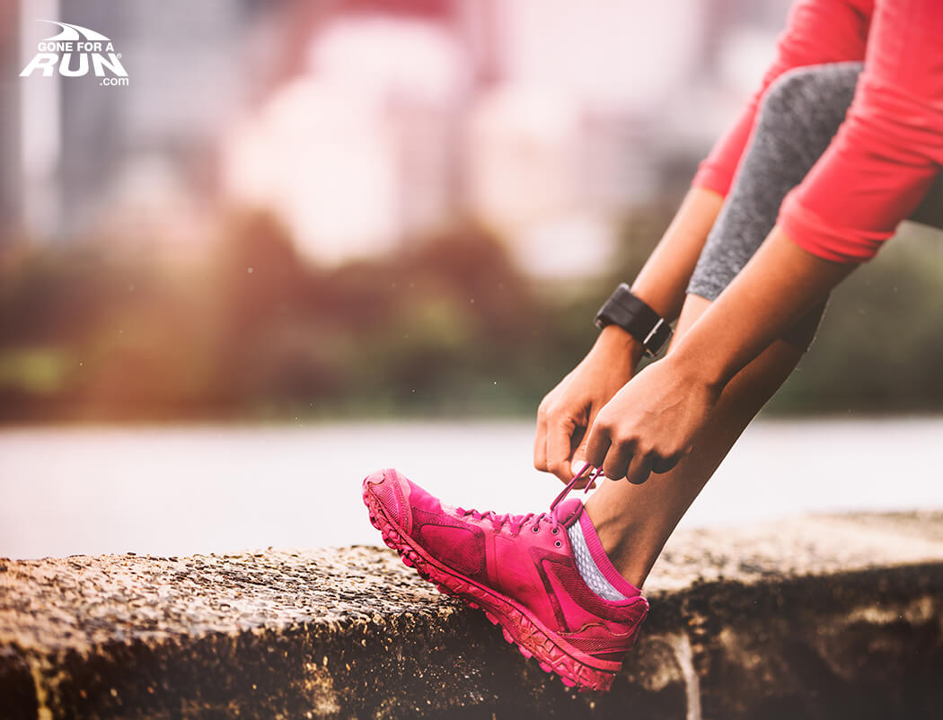 Making Running A Habit - Girl tying her sneakers